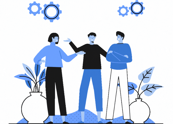 Image of three employees talking and smiling.