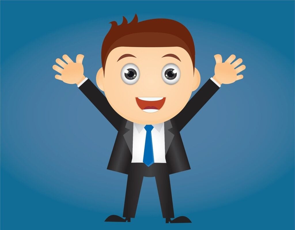 Business man that is happy because he understands why employee well-being is important.